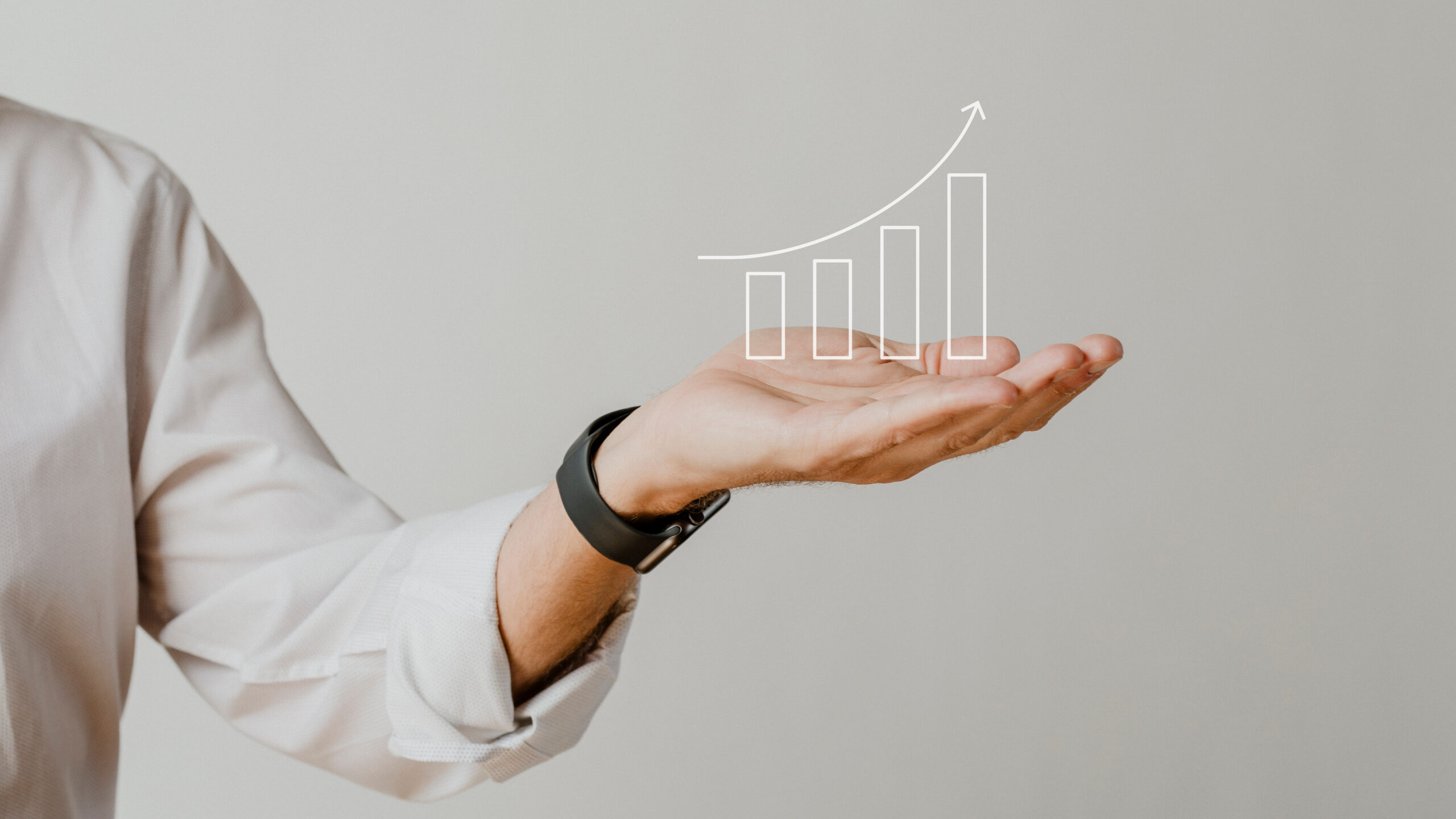 Presenting arm isolated on beige Digital increasing bar graph with businessman hand overlay